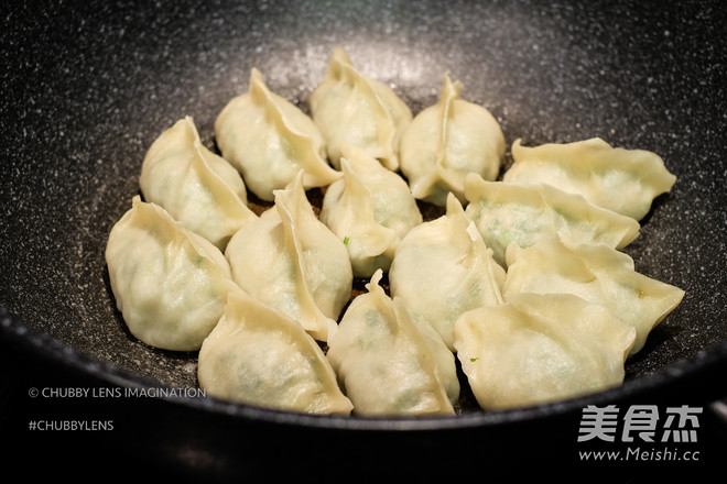 Fried/cooked Chives and Meat Handmade Dumplings recipe
