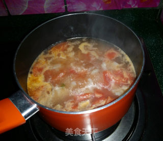 Cod Fish Soup with Greens and Tomatoes recipe