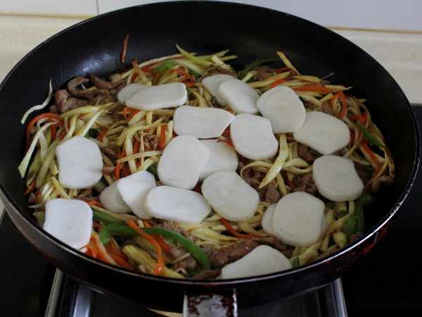 Stir-fried Rice Cake with Rice White Pork recipe