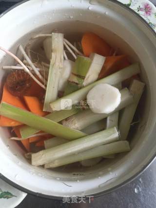 Carrot, Bamboo Cane, Horseshoe and Horseshoe in Clay Pot recipe