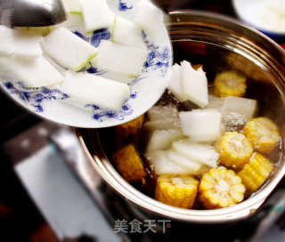 Cooking Corn and Winter Melon Pork Rib Soup in A Boiling Pot Off The Fire recipe