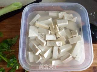 Loofah Preserved Egg Tofu Soup recipe