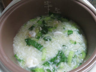 Two Rice Congee with Salted Duck Eggs and Vegetables recipe