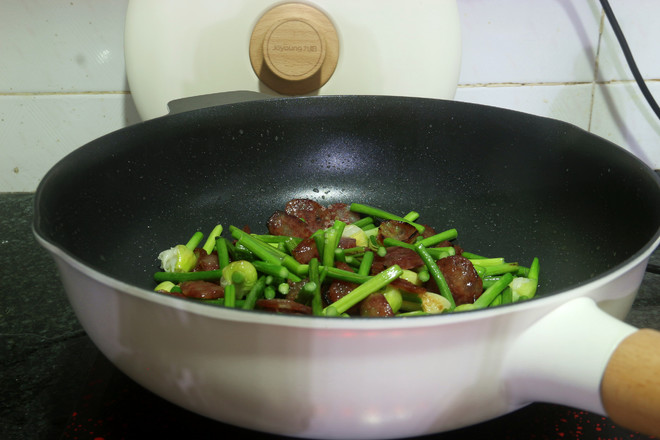 Stir-fried Sausage with Garlic Stalks recipe