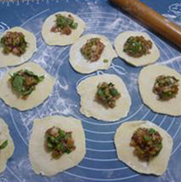 Steamed Dumplings with Mustard, Celery, Pork and Cornmeal recipe