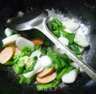 Stir-fried Rice Cake with Corn Hot Dog Intestines and Rape recipe