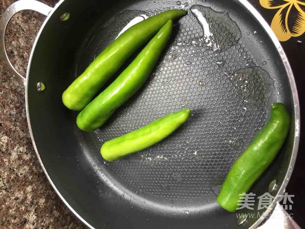 Braised Tiger Skin Peppers with Fish in Black Bean Sauce recipe