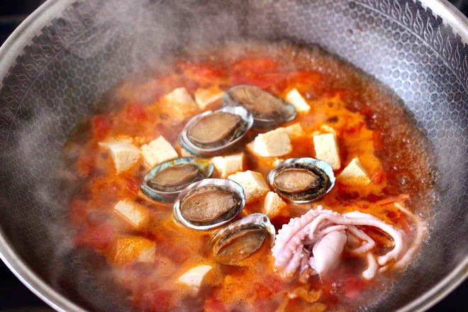 Abalone Tomato Seafood Tofu Soup recipe