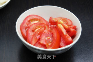 Sweet and Sour Rice Cake Cooked in Tomato Sauce recipe