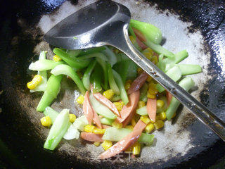 Stir-fried Vegetable Stems with Corn and Ham Sausage recipe