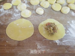 Steamed Dumplings with Corn Flour and Sauerkraut Stuffing recipe