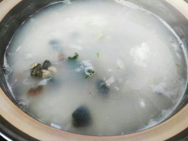 Spinach Songhua Egg Lean Pork Congee recipe