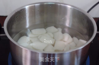 Sweet and Sour Rice Cake Cooked in Tomato Sauce recipe