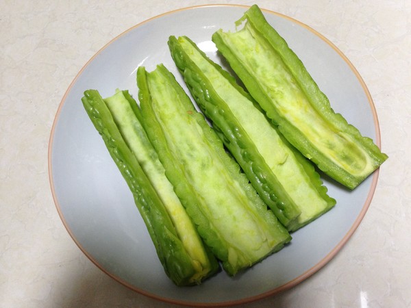 Golden Garlic Mixed with Bitter Gourd recipe