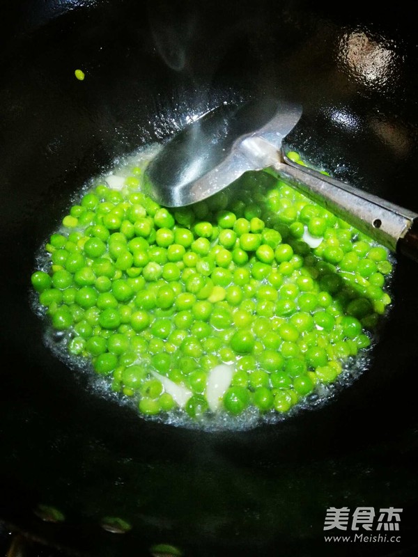Stir-fried Green Peas and Rice recipe