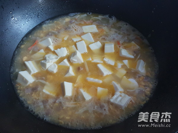 Salted Egg Yolk Tofu Soup recipe