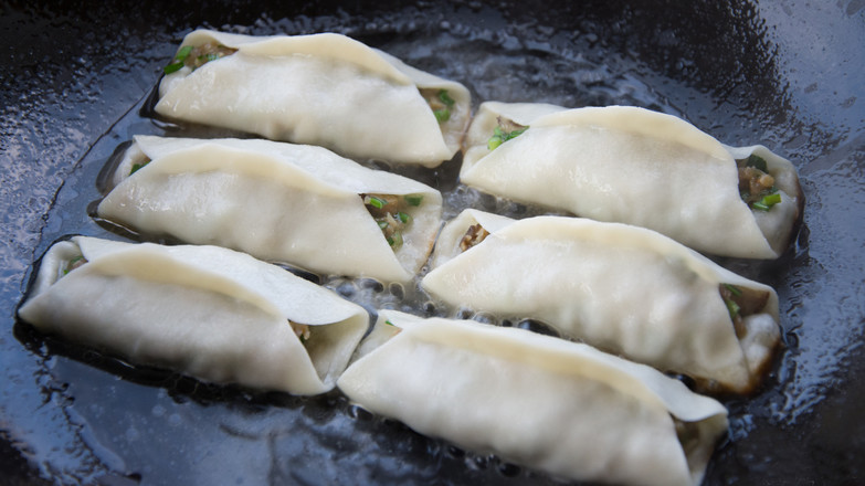 Leek and Fresh Meat Open Pot Stickers recipe