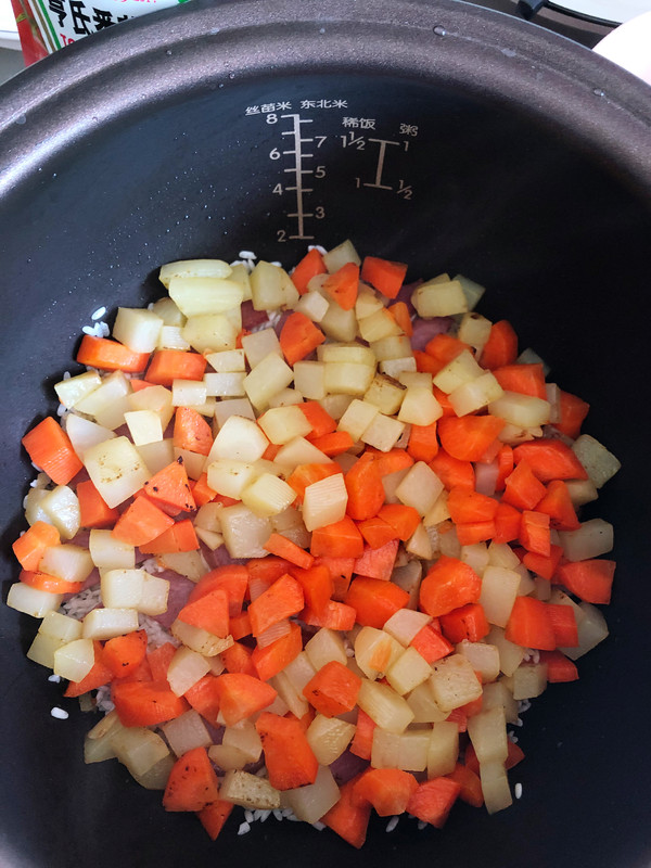 Stewed Rice with Tomato Sauce and Potato Sausage recipe