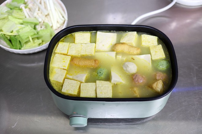 Golden Soup with Cabbage Tofu and Fish Balls recipe