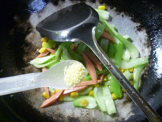 Stir-fried Vegetable Stems with Corn and Ham Sausage recipe