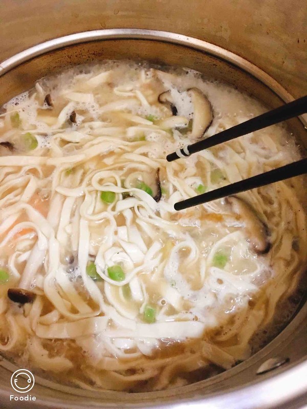 Handmade Noodles with Seafood, Mushrooms and Shrimps recipe