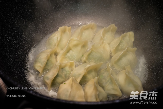 Fried/cooked Chives and Meat Handmade Dumplings recipe