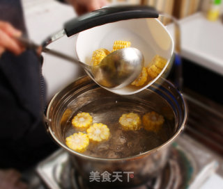 Cooking Corn and Winter Melon Pork Rib Soup in A Boiling Pot Off The Fire recipe