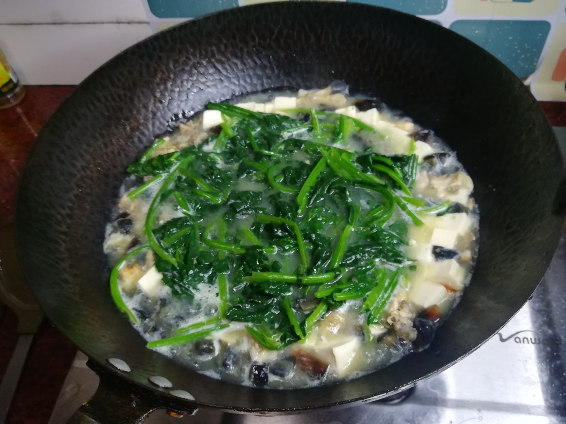 Spinach with Preserved Egg in Soup recipe