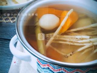 Carrot, Bamboo Cane, Horseshoe and Horseshoe in Clay Pot recipe