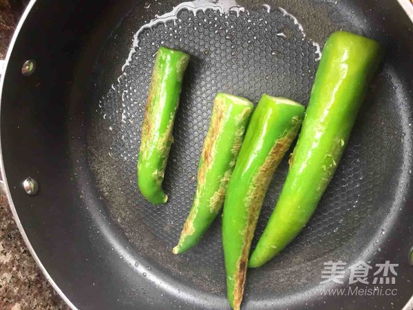 Braised Tiger Skin Peppers with Fish in Black Bean Sauce recipe