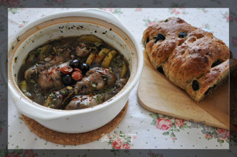 Spicy Sausage and Olive Roasted Chicken Wings with Black Olive Bread recipe