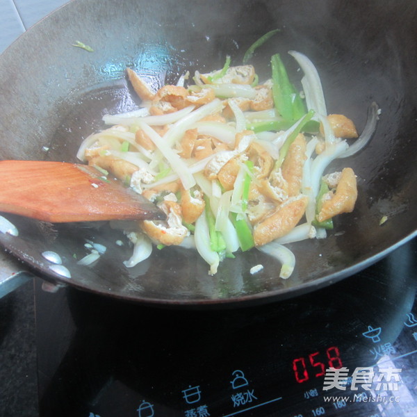 Stir-fried Tofu Shreds with Cabbage Stems recipe