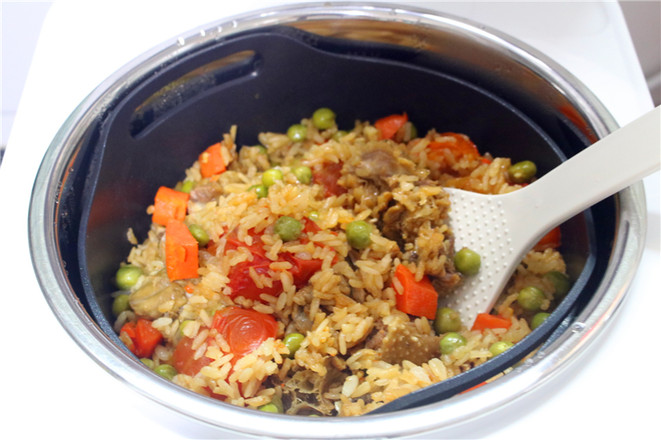 Salted Goose Pea Tomato Braised Rice recipe