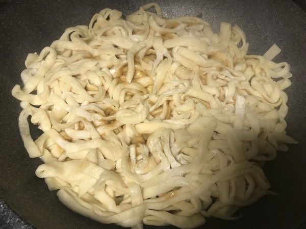 Braised Noodles with Pork Belly and Beans recipe