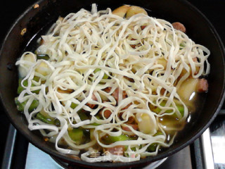 Braised Noodles with Soy Sauce, Potatoes and Sausages recipe