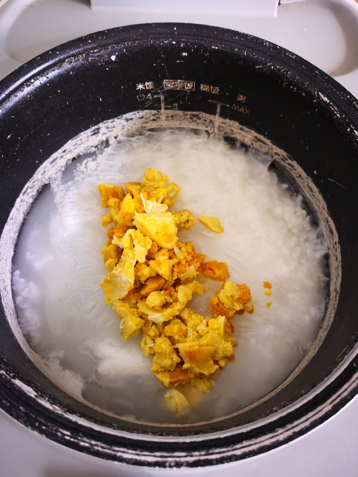 Salted Egg Yolk Rice Porridge recipe