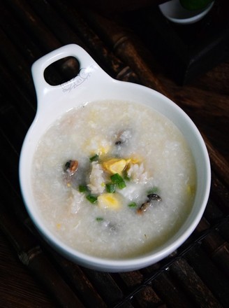Salted Egg Congee with Squid and Oyster Sauce