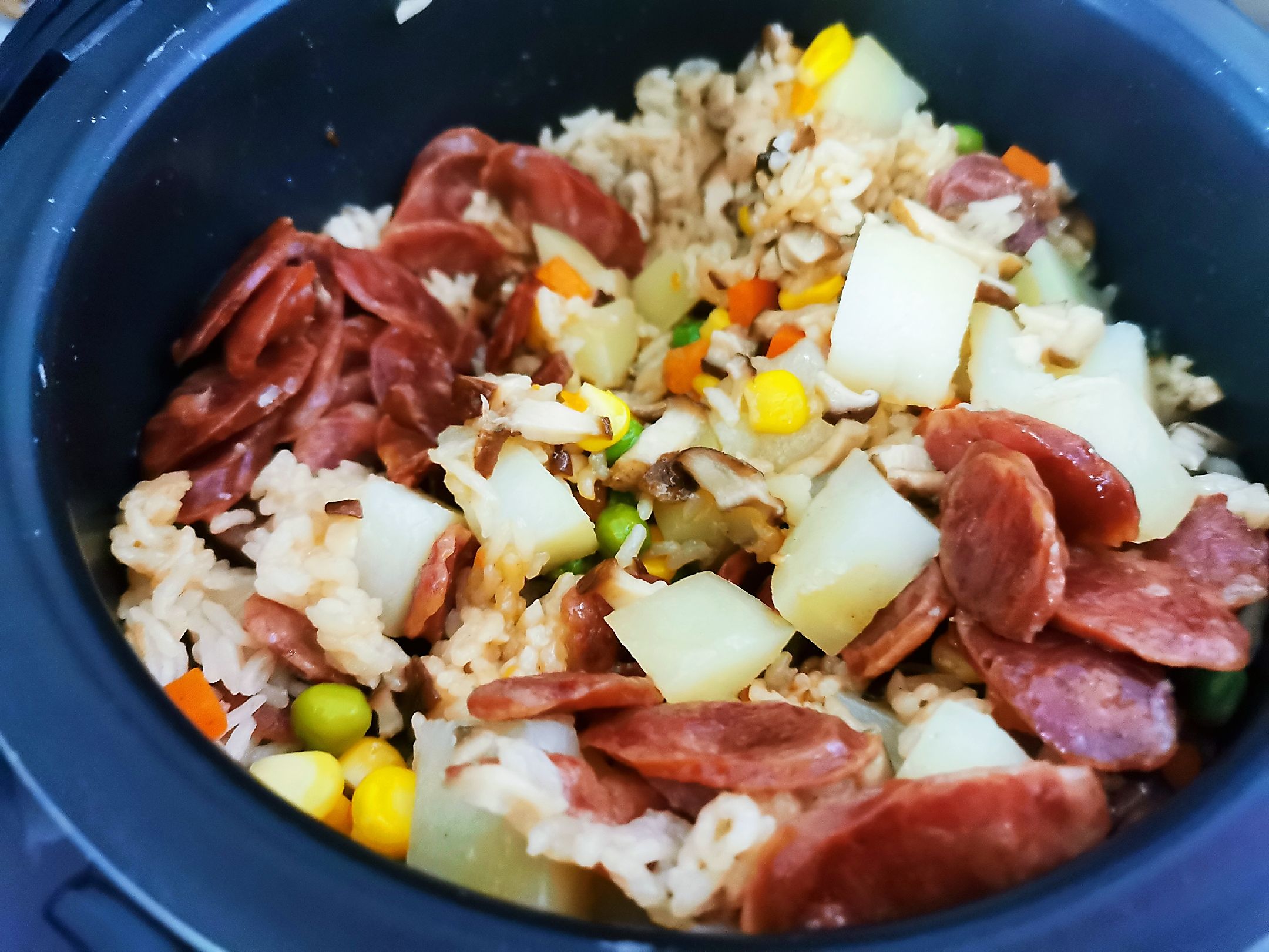 Potato Sausage Braised Rice recipe