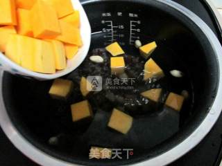 #铁锅烧饭就是香# Pumpkin Black Rice Mixed Grain Porridge recipe