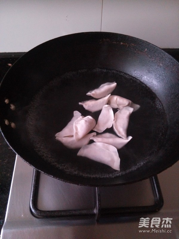 Bamboo Shoots and Dried Vegetables Pork Dumplings recipe