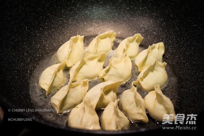 Fried/cooked Chives and Meat Handmade Dumplings recipe